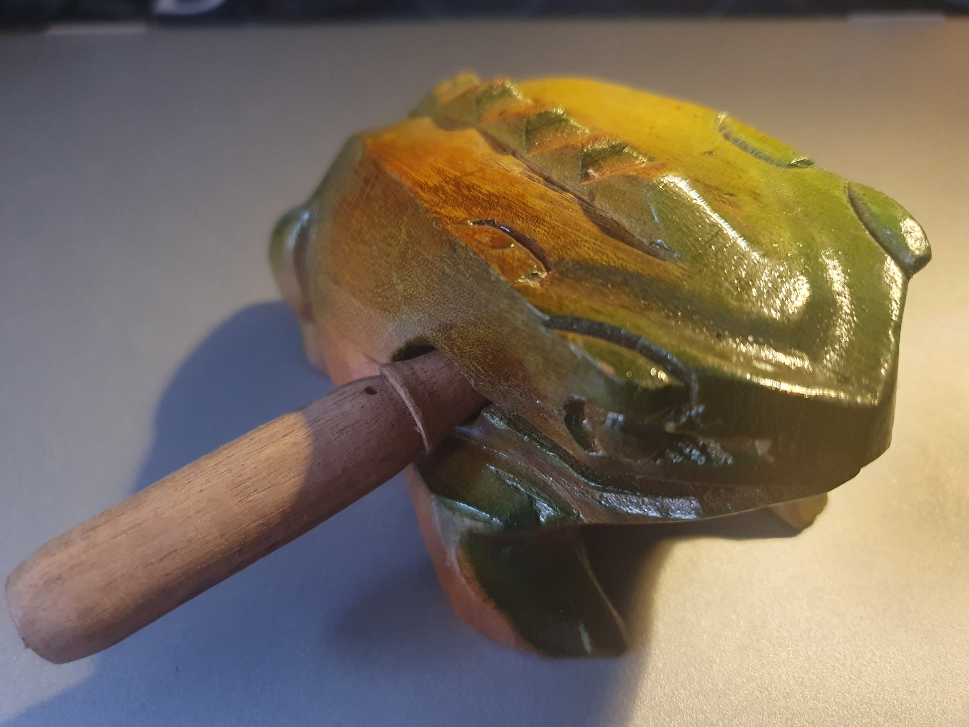 Green guiros vietnamese percussion instrument mimics a frogs real croak